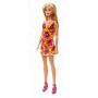 Muñeca Barbie con vestido amarillo con flores