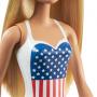 Muñeca Barbie, rubia, en traje de baño con la bandera de EE. UU.