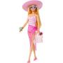 Muñeca Barbie rubia con traje de baño y accesorios de playa