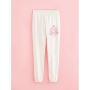 Joggers con eslogan color crema de Barbie